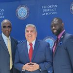 Pastor Henry with Brooklyn DA, Eric Gonzalez and Pastor Gilford T. Monrose